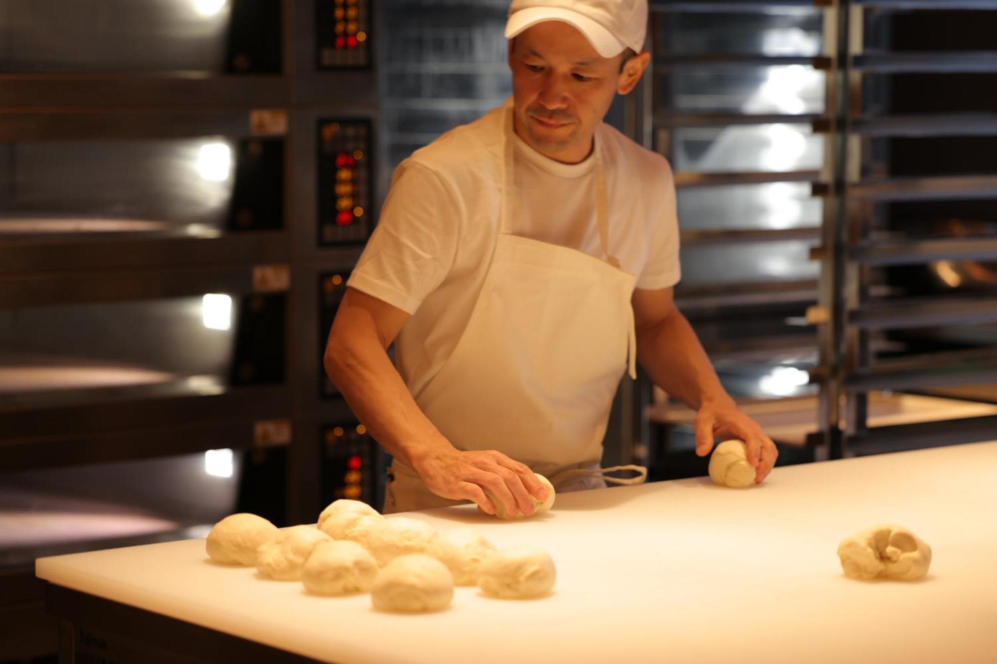 Nohga Hotel Kiyomizu Kyoto Bagian luar foto A baker preparing bread dough